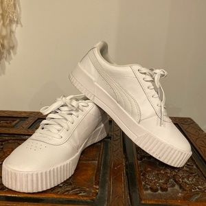 Lightly used white puma trainers